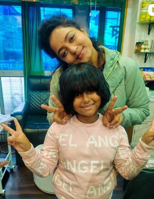 Baby Chinese haircut style and gentle kids hair styling for girls at Star Beauty Salon Behala